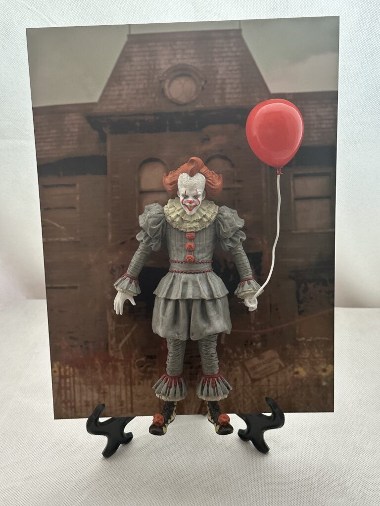 Horror edition collectable figure and display (horror clown), custom background. Includes stand and wall attachment
